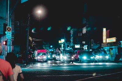 Cars on road at night