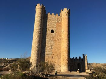 Low angle view of tower against clear sky