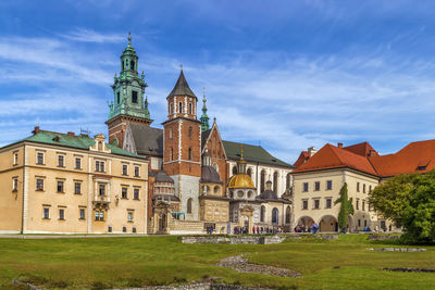 View of buildings in city against sky