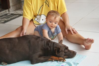 Happy friends lying on floor