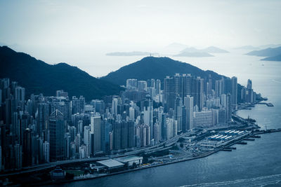 Panoramic view of city buildings against sky