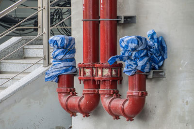 Close-up of pipe against building