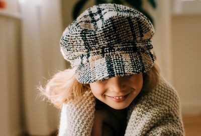 Portrait of smiling girl wearing hat