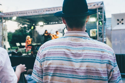 Close-up of man standing at concert