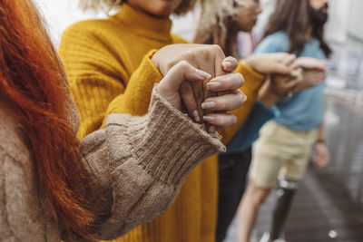 Activists holding hands with each other