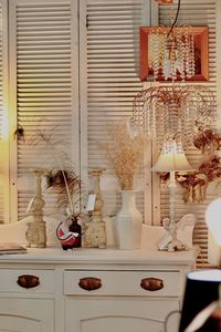 Christmas decorations hanging on table at home