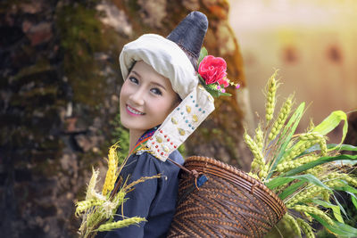 Portrait of smiling young woman outdoors