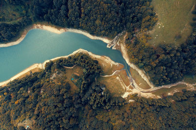 High angle view of rock in sea