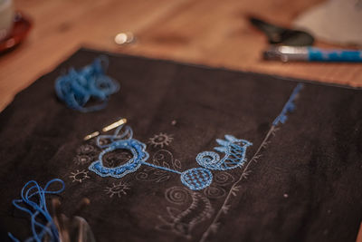 High angle view of mural on table