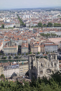 Aerial view of cityscape against sky