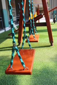 Low section of child playing on playground