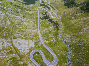 High angle view of road amidst trees