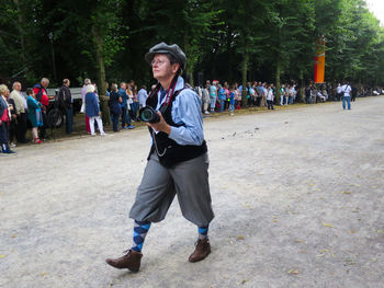 Full length of man standing in park