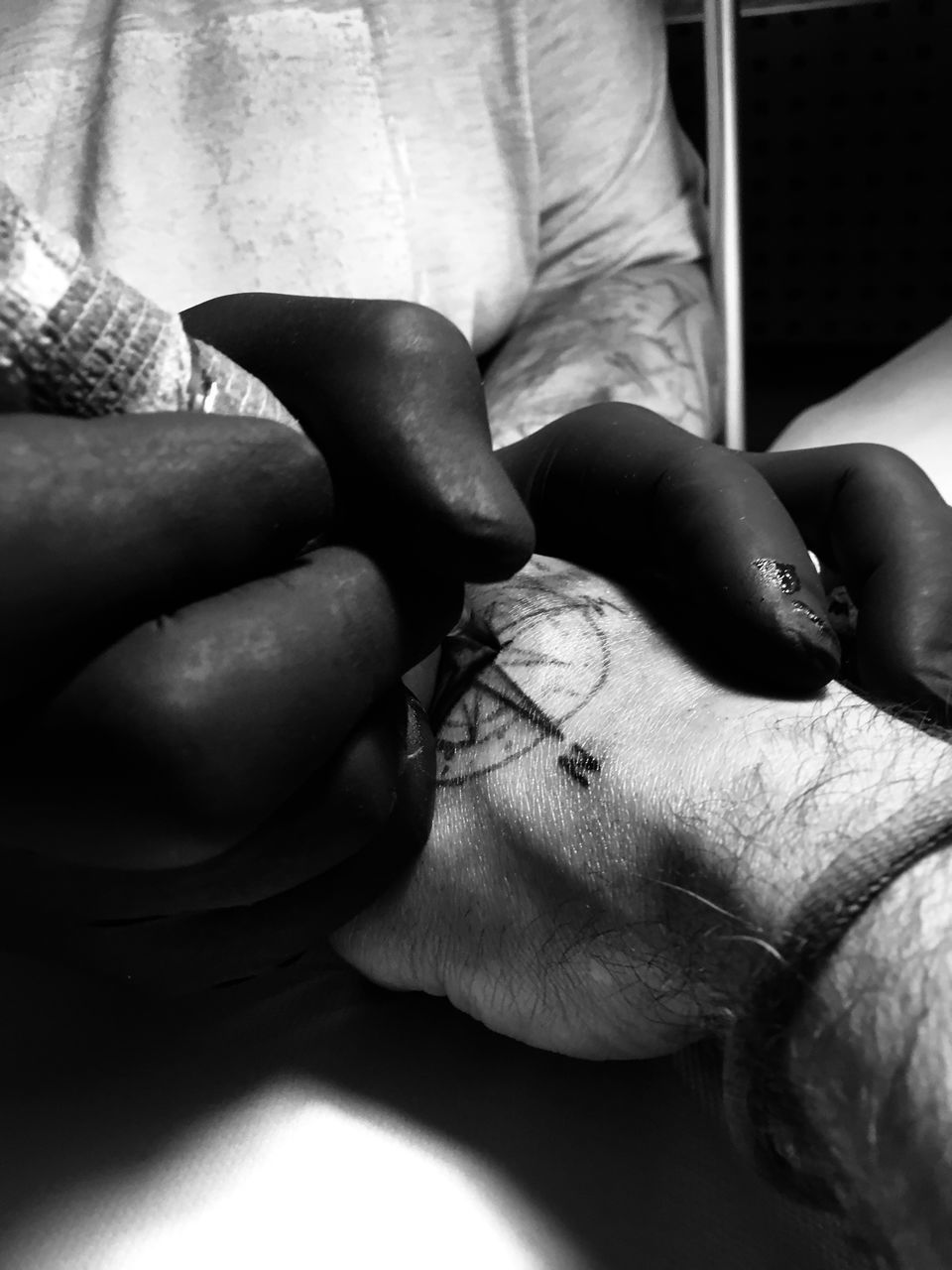 CLOSE-UP OF HAND HOLDING HANDS WITH PEOPLE