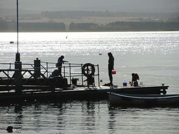 People on boat in sea