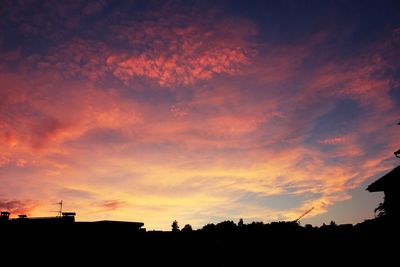 Silhouette of built structure at sunset