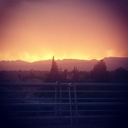 Scenic view of mountains at sunset