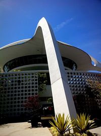 Low angle view of building against blue sky