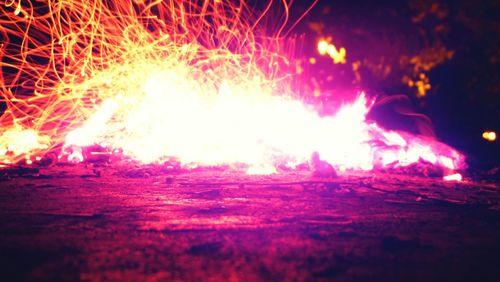 Close-up of firework display at night