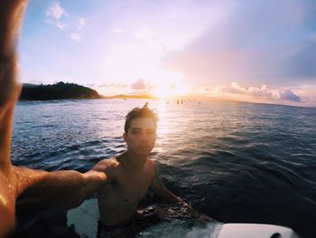 Man swimming in sea