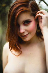 Close-up portrait of a smiling young woman