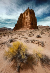 Rock formations in desert against sky