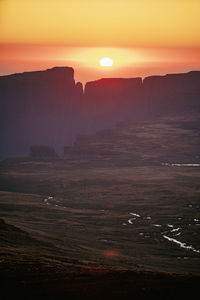 Scenic view of sea against sky during sunset in the drakensberg, south africa.