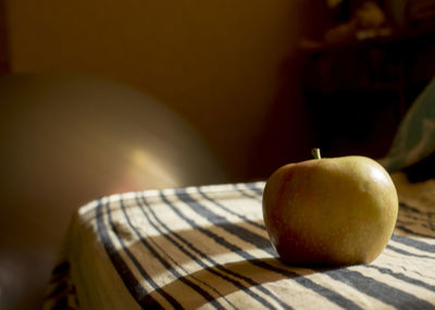 Close-up of apple on table