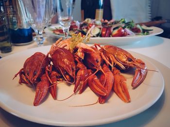 Close-up of crawfish served in plate on table