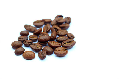 Close-up of cake against white background