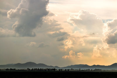 Scenic view of mountains against sky during sunset