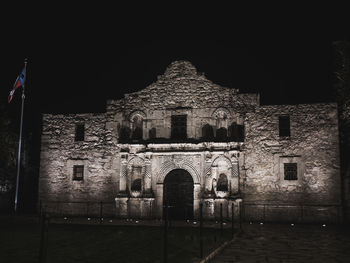 Built structure against sky at night