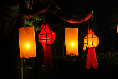 Close-up of illuminated lantern hanging at night