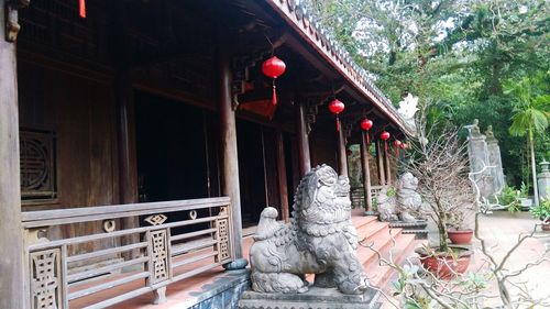 Statue against building