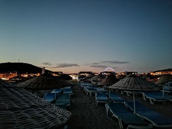 Panoramic view of buildings against clear sky at sunset