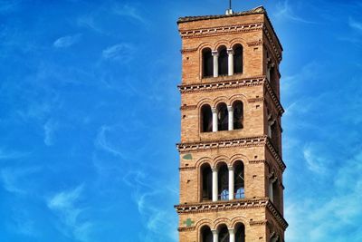 Low angle view of building against blue sky