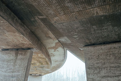 Curved concrete bridge from below