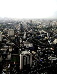 High angle view of buildings against sky in city