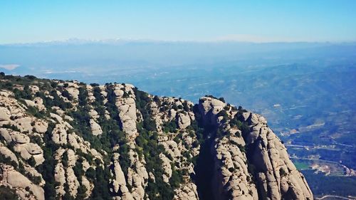 Panoramic view of rocky mountains against sky