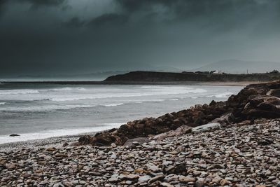 Scenic view of beach against sky