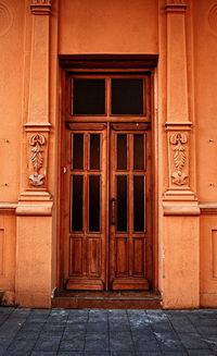 Closed wooden door of building