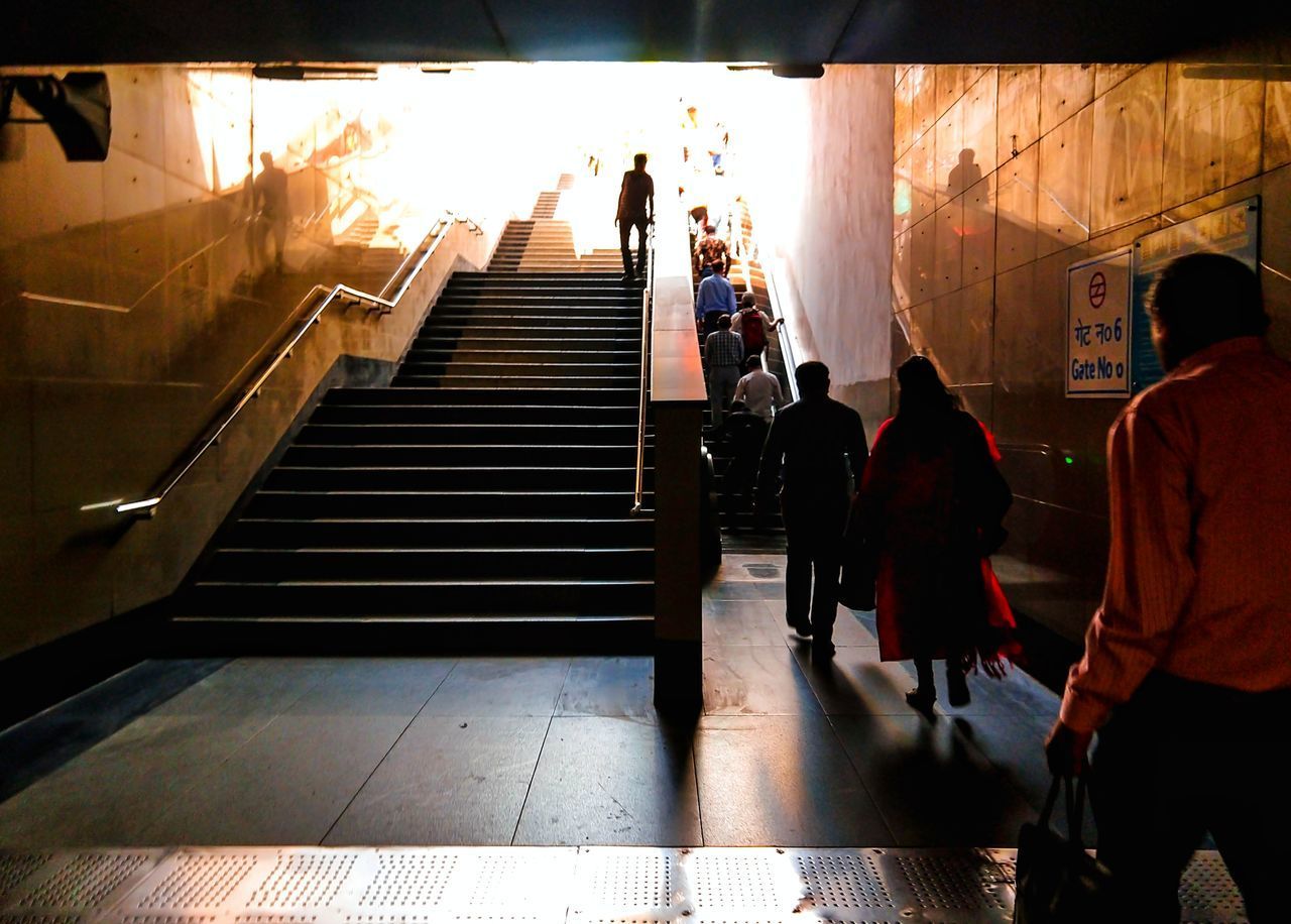 PEOPLE WALKING ON SUBWAY