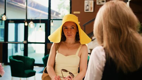 Young woman wearing hat