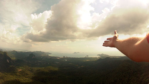 Scenic view of sea against cloudy sky