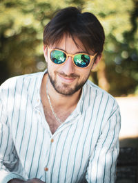 Portrait of young man wearing sunglasses