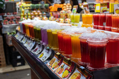 Close-up of drinks in store at market