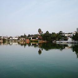 Reflection of built structure in calm lake