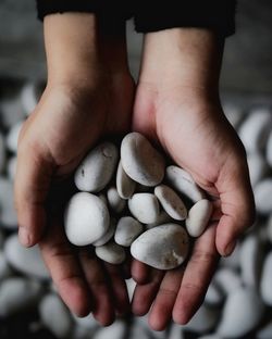 Close-up of person holding hands