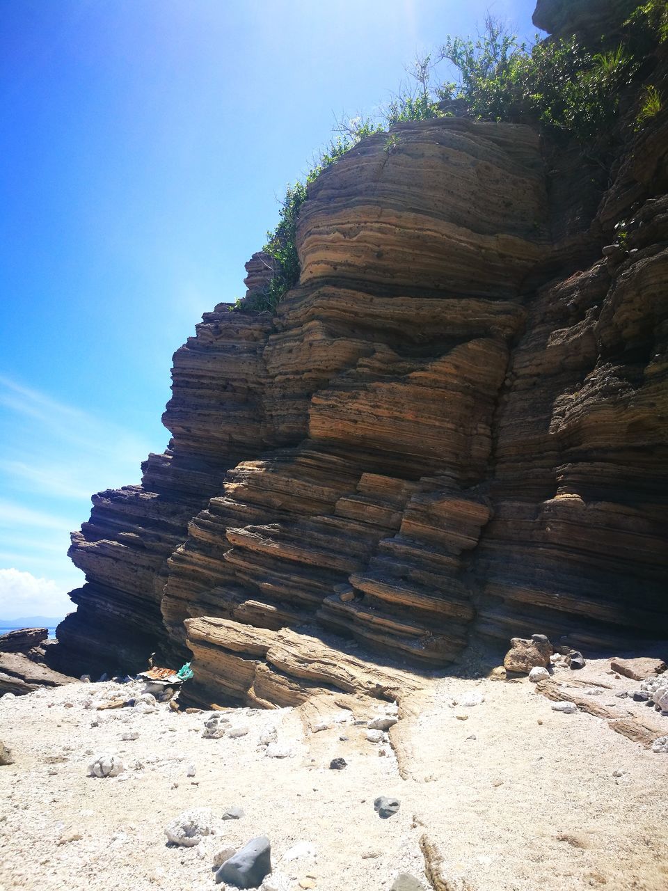 nature, tranquil scene, tranquility, day, rock - object, geology, stack, non-urban scene, physical geography, beauty in nature, outdoors, scenics, sunlight, sky, no people, sand, landscape, arid climate