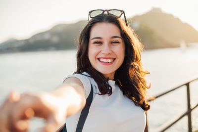 Portrait of smiling young woman